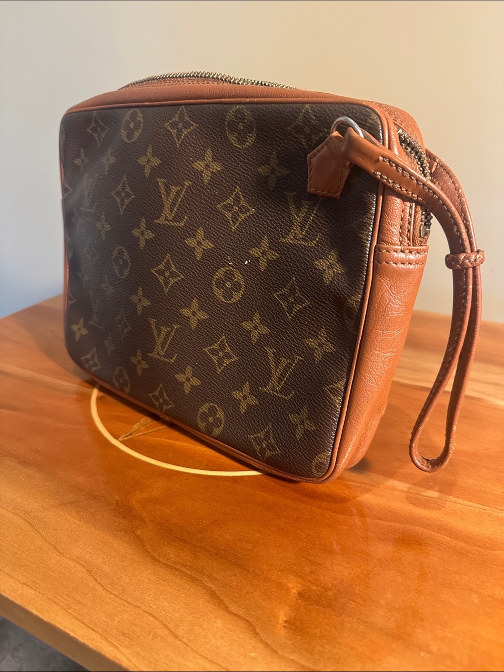 Authentic Louis Vuitton Monogram Pochette Sport.